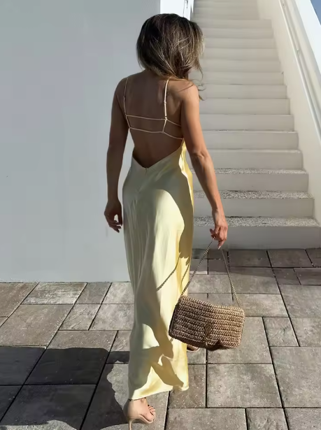 Versatile flowing women's maxi slip dress, perfect for elegant evening wear & timeless style.