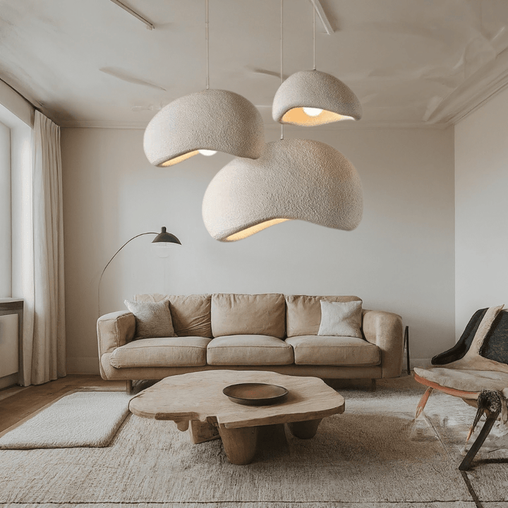 Sculpted Dome Wasabi pendant light, adjustable height for modern dining room lighting and contemporary decor.