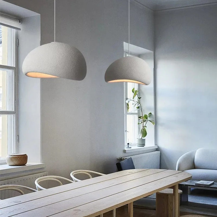 Stylish sculpted dome pendant light, adjustable height, excellent modern lighting for various contemporary home spaces.