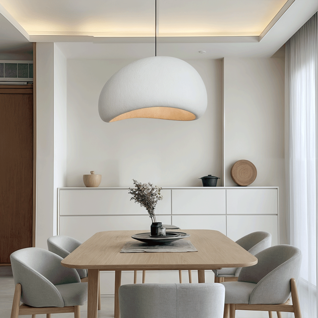 Living room sculpted dome pendant light, adjustable, providing modern and elegant interior ceiling illumination.