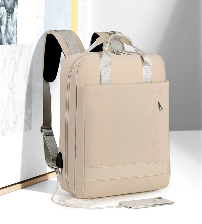 Spacious interior of anti-theft backpack for laptop & essentials. Secure design with hidden zippers & USB charging.