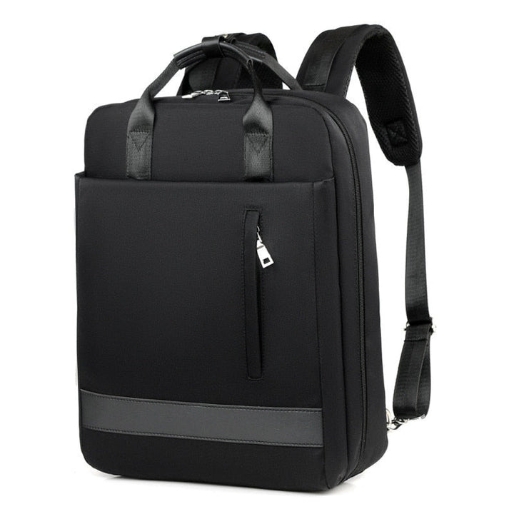 Unisex model wearing a sleek anti-theft backpack. Perfect secure travel & commuter bag with hidden zippers & USB.