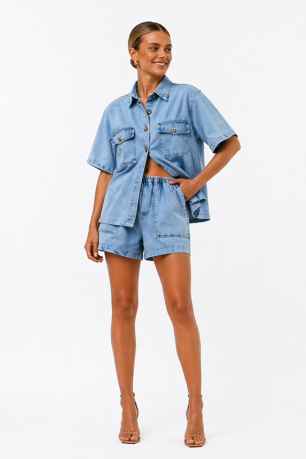 Relaxed fit women's denim two-piece set, including a button shirt and comfortable high-waist shorts for everyday.