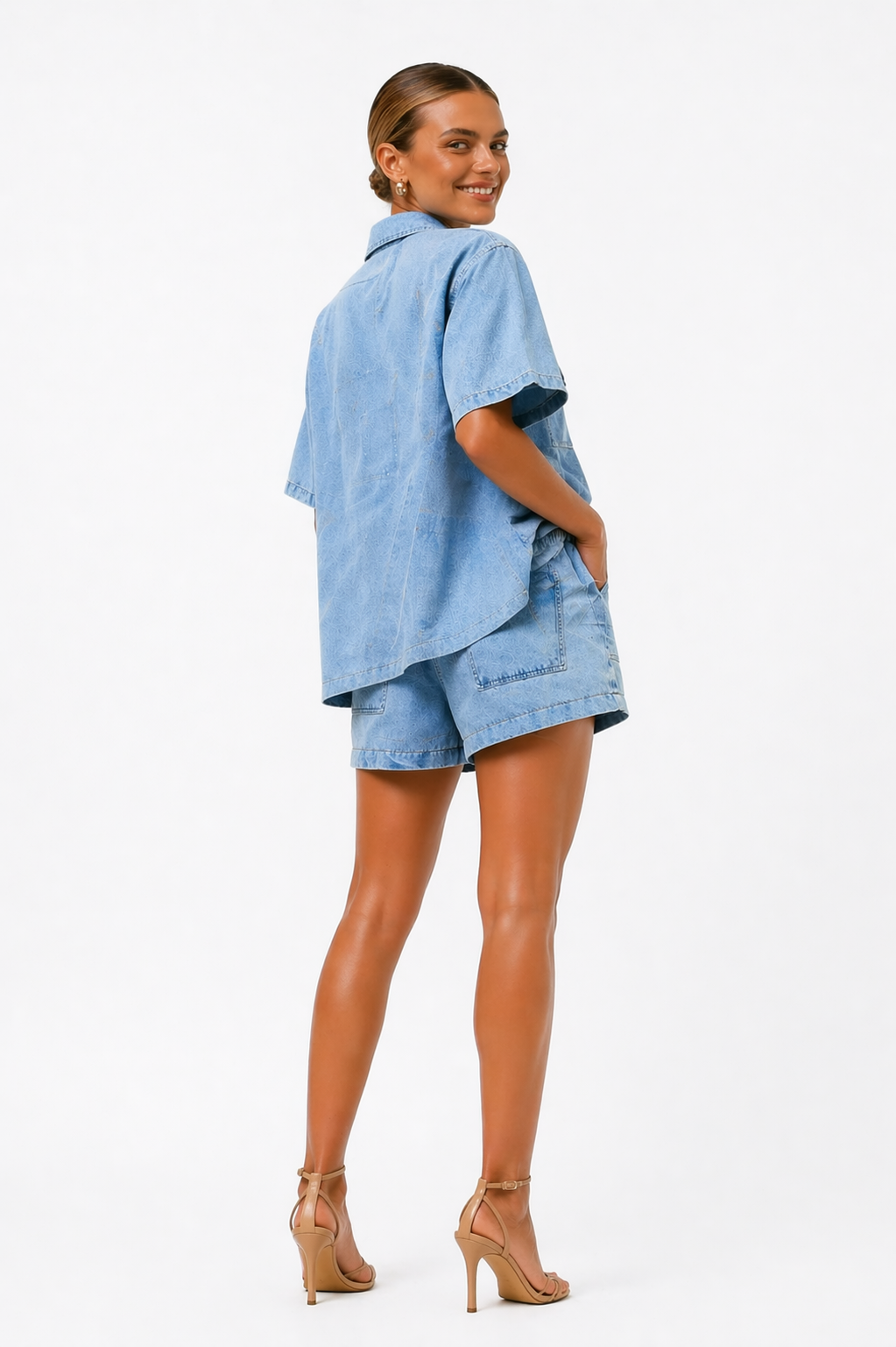 Versatile women's denim co-ord set featuring a casual shirt and high-waist shorts, ideal for spring & summer.