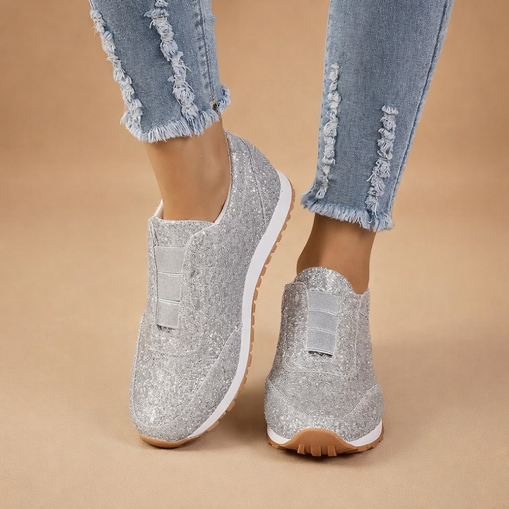 Glamorous women's glitter slip-on shoes, combining sparkle & comfort for versatile casual outfits.