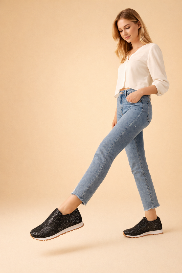 Sparkly women's slip-on casual sneakers, offering easy wear and a fashionable glitter finish.