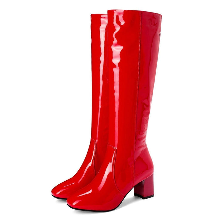 Women's shiny black knee-high boots with a sturdy block heel and round toe, perfect for fall fashion.