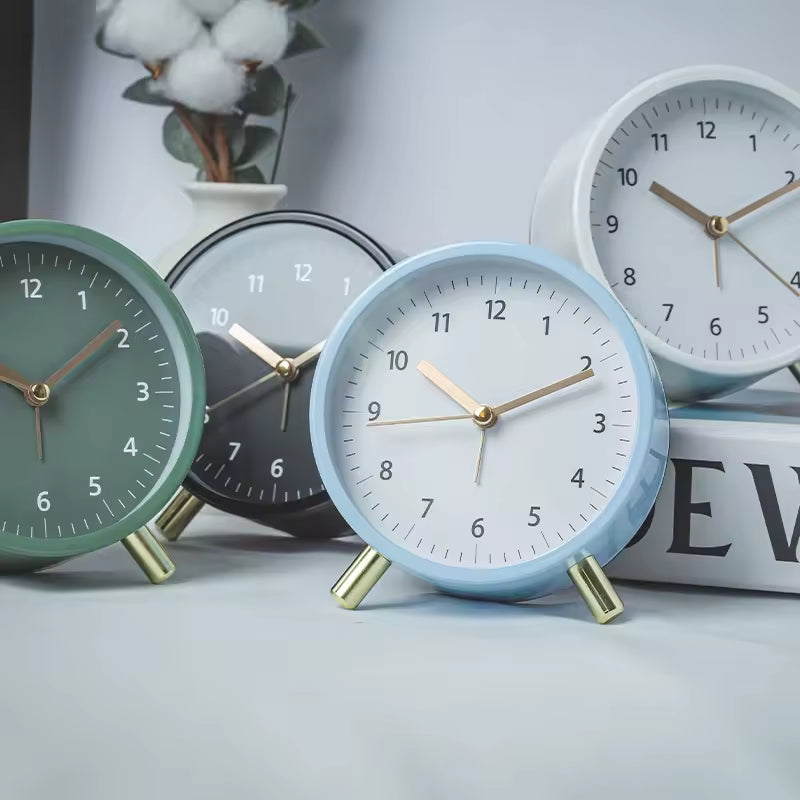Battery-operated silent minimalist table clock with Scandinavian design, essential modern home accessory.
