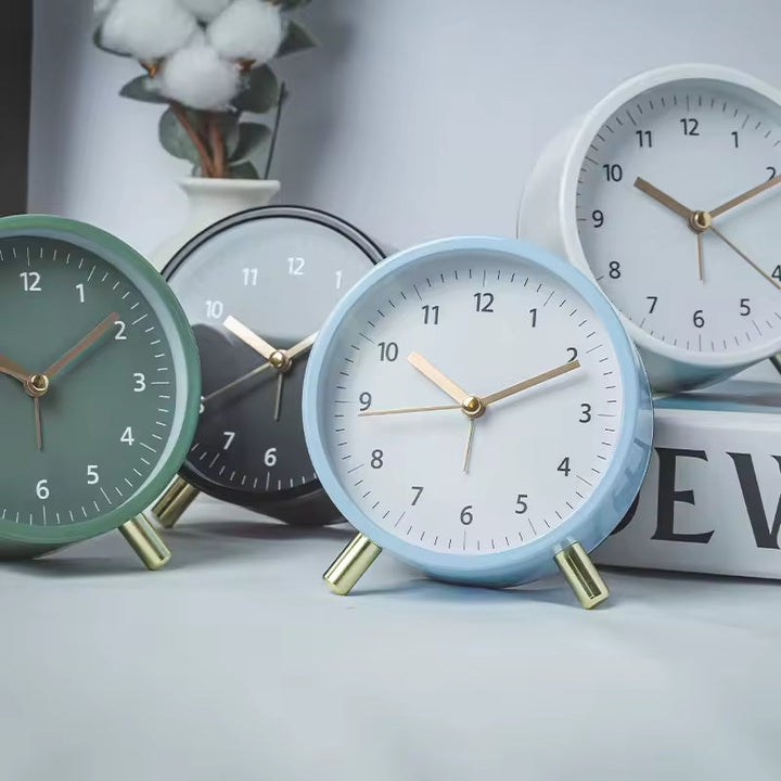Battery-operated silent minimalist table clock with Scandinavian design, essential modern home accessory.