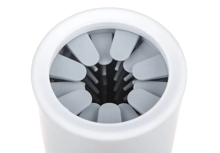 Gentle silicone paw cleaner for pets, featuring soft bristles for thorough yet gentle cleaning of sensitive paws. Portable and eco-friendly, ideal for dogs and cats.