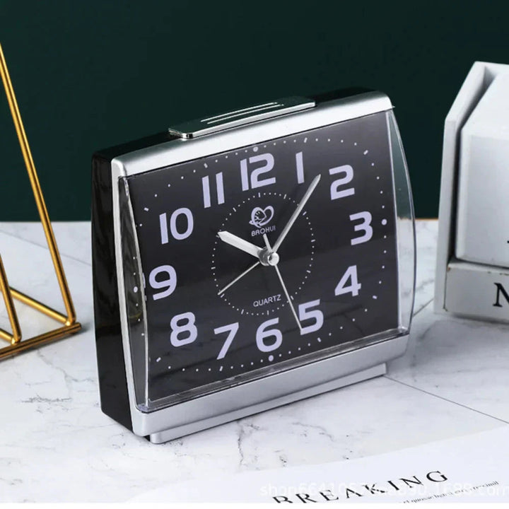 Loud alarm clock for seniors, ensuring easy waking with a large, backlit display and silent movement.