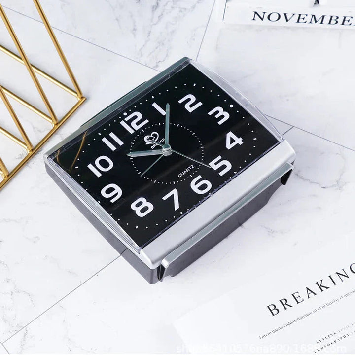 Senior bedside alarm clock with large, backlit display, loud alert, and silent quartz movement.