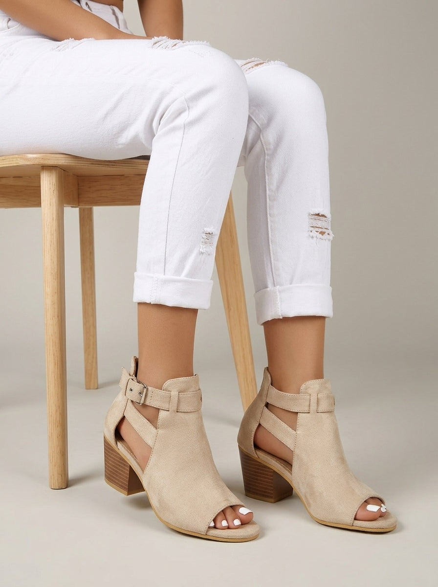 Women's peep toe sandals with comfortable block heel & adjustable ankle buckle strap. Elegant summer footwear.