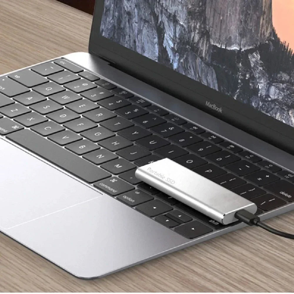 Sleek 4TB USB-C external drive with slim metal casing, ideal for portable storage, compatible with PC and Mac.