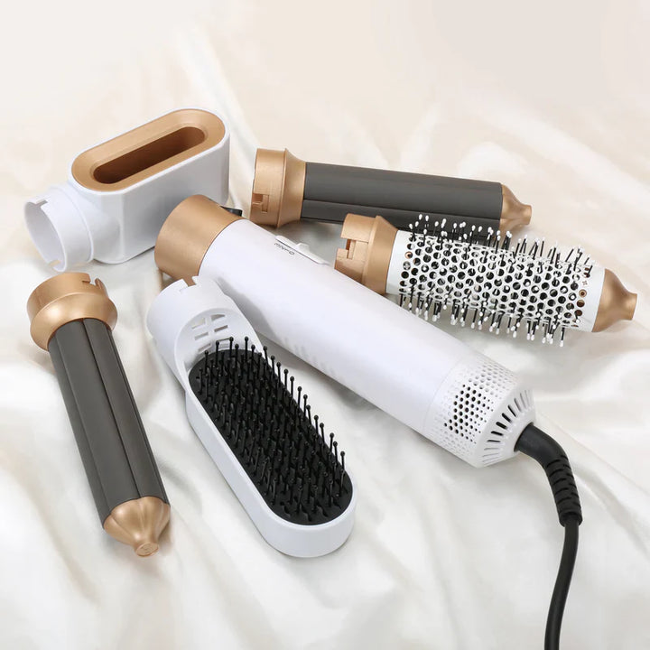 "Sleek 5-in-1 hair styler with attachments for curling, straightening, and drying; compact design, fits all hair types."
