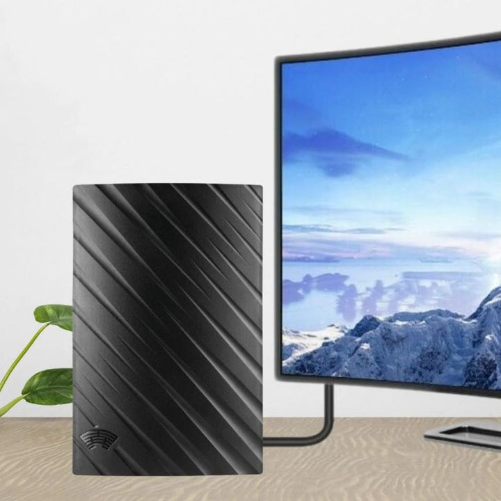 Sleek FreeStream 4K Indoor TV Aerial captures free HD channels with ease, compact design ideal for elegant home setups.