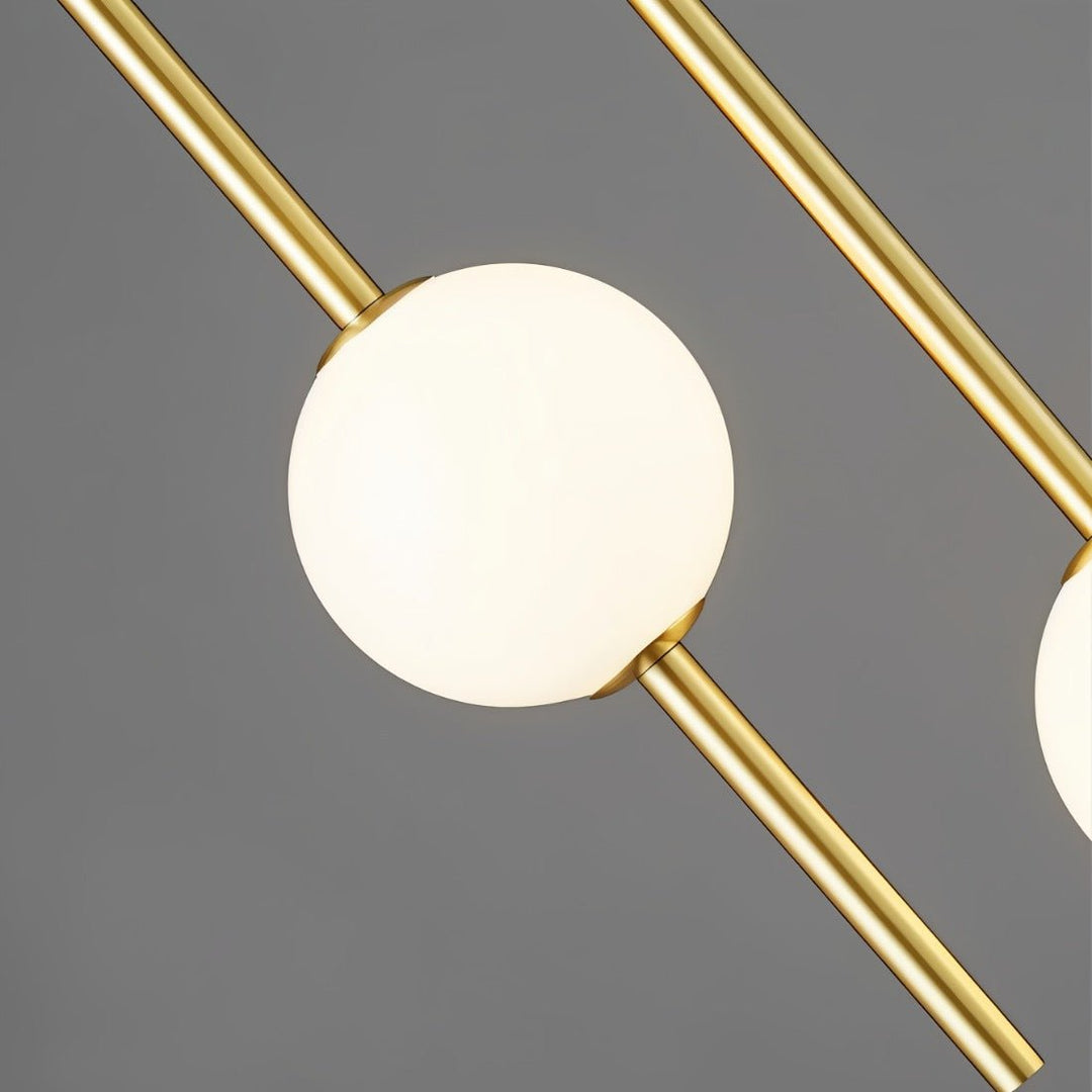 "Sleek glass ball Nordic pendant light with metal frame, LED bulb; available in black or brass, perfect for modern decor."
