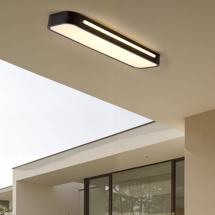 "Sleek minimalist linear LED ceiling light with iron and acrylic design, perfect for modern homes, available in three sizes."