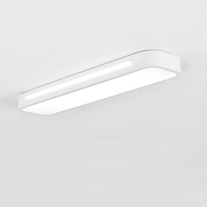 "Sleek minimalist linear LED ceiling light with iron and acrylic design, perfect for modern homes, available in three sizes."