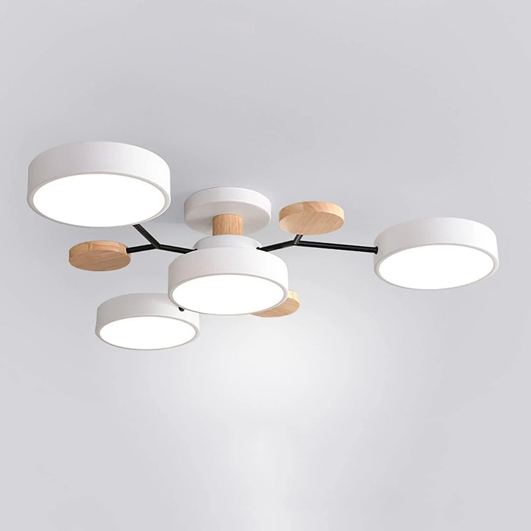 "Sleek modern halo LED semi-flush ceiling light, iron and acrylic build, perfect for contemporary living rooms or bedrooms."