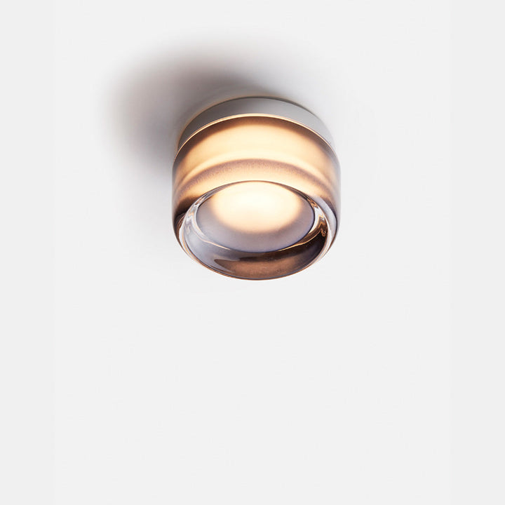 "Sleek wall mounted LED sconce light with acrylic and aluminum design, offering versatile decor enhancement for modern interi