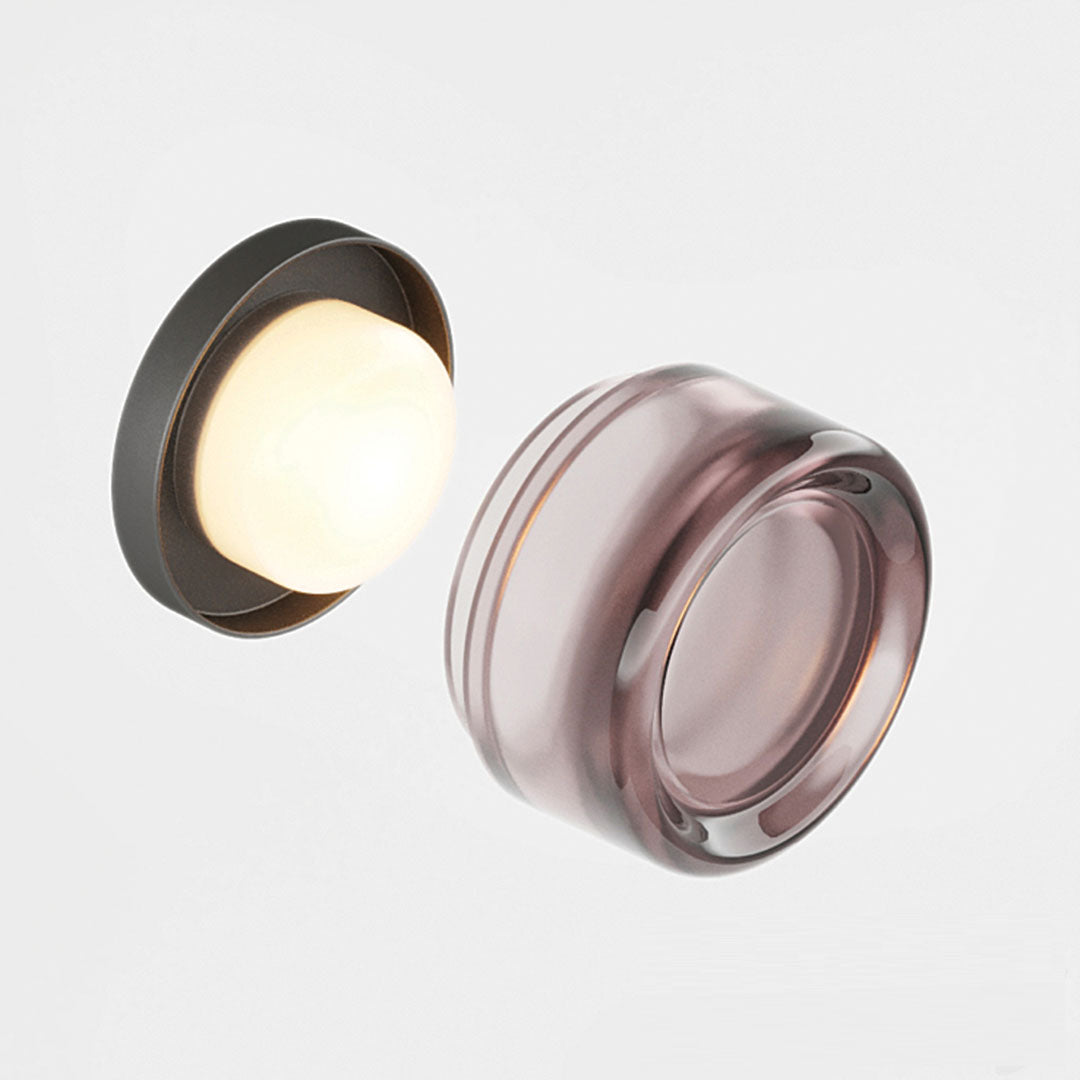 "Sleek wall mounted LED sconce light with acrylic and aluminum design, offering versatile decor enhancement for modern interi
