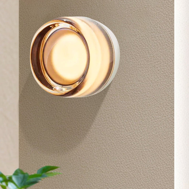 "Sleek wall mounted LED sconce light with acrylic and aluminum design, offering versatile decor enhancement for modern interi