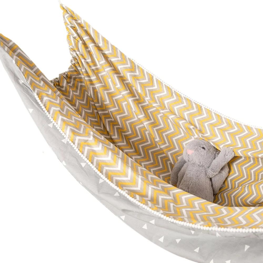 Soft cotton baby indoor hammock for newborn comfort, infant sleep, and gentle sensory play in nursery or travel.