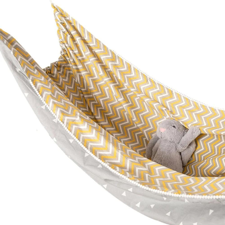 Soft cotton baby indoor hammock for newborn comfort, infant sleep, and gentle sensory play in nursery or travel.