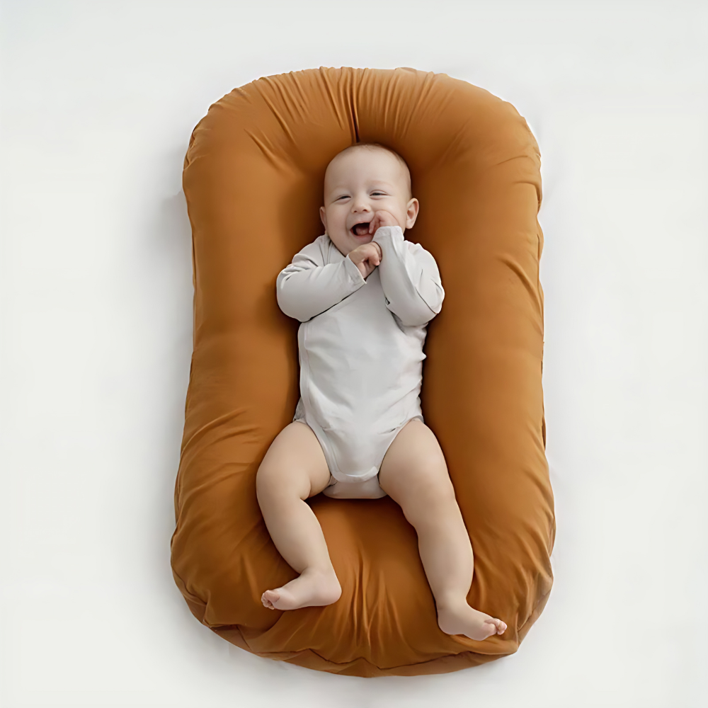 Close-up of a soft, breathable cotton baby orthopedic pillow, designed for newborn comfort and head support.