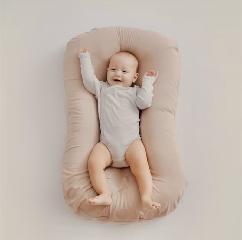 Compact & soft baby orthopedic pillow, ideal for infants, providing breathable support as a nursery essential.