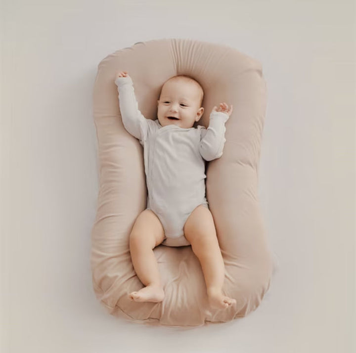 Compact & soft baby orthopedic pillow, ideal for infants, providing breathable support as a nursery essential.