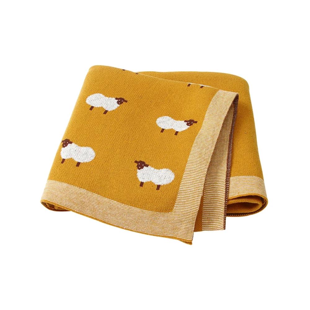 Cozy & soft cotton knit infant blanket, gentle on newborn skin for peaceful sleep.