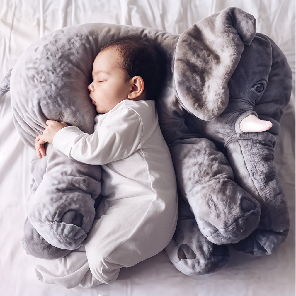 Soft plush elephant hug pillow for kids' cozy comfort, perfect for nursery decor and playtime.