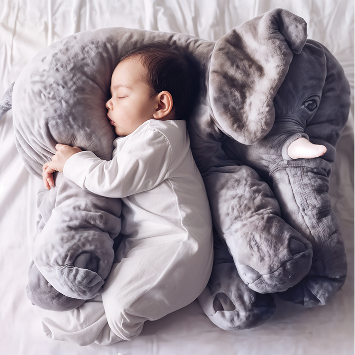 Soft plush elephant hug pillow for kids' cozy comfort, perfect for nursery decor and playtime.