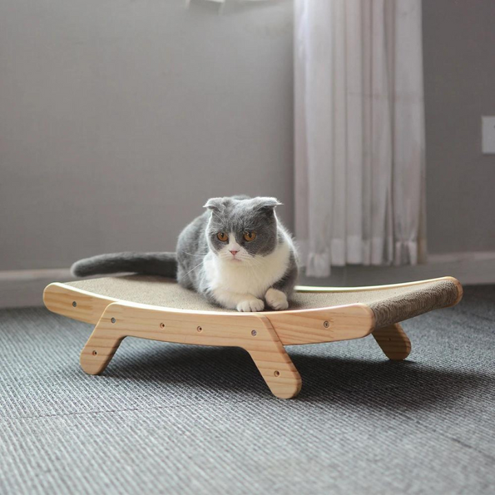 Solid wood Ergonomic ScratchSlope cat scratcher for healthy play. Durable pet furniture & activity pad.