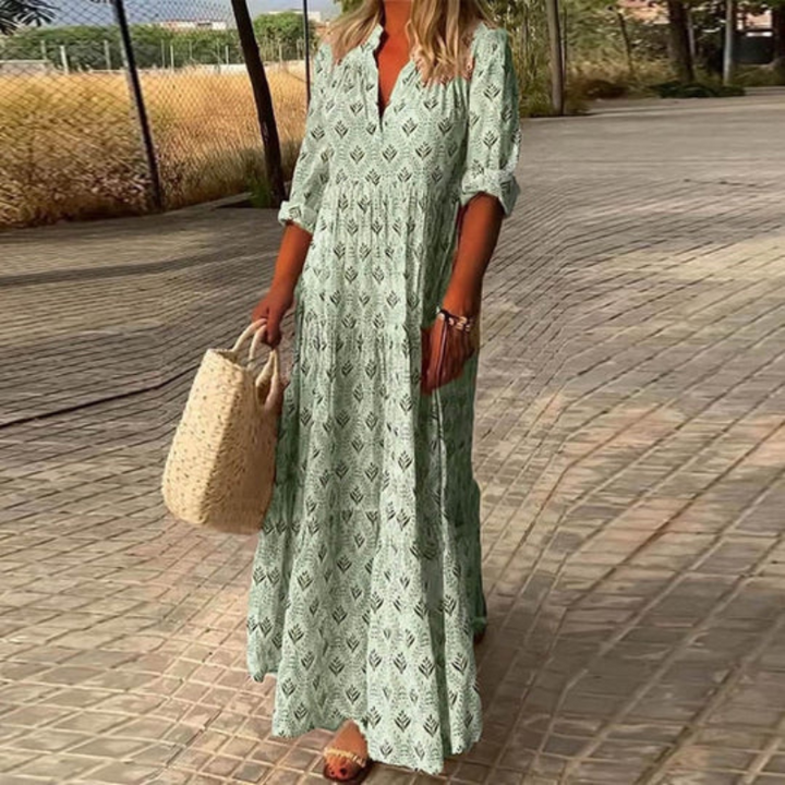 Chic women's bohemian summer maxi dress. Flowy, colorful, perfect for beach, vacation, or elegant everyday wear.
