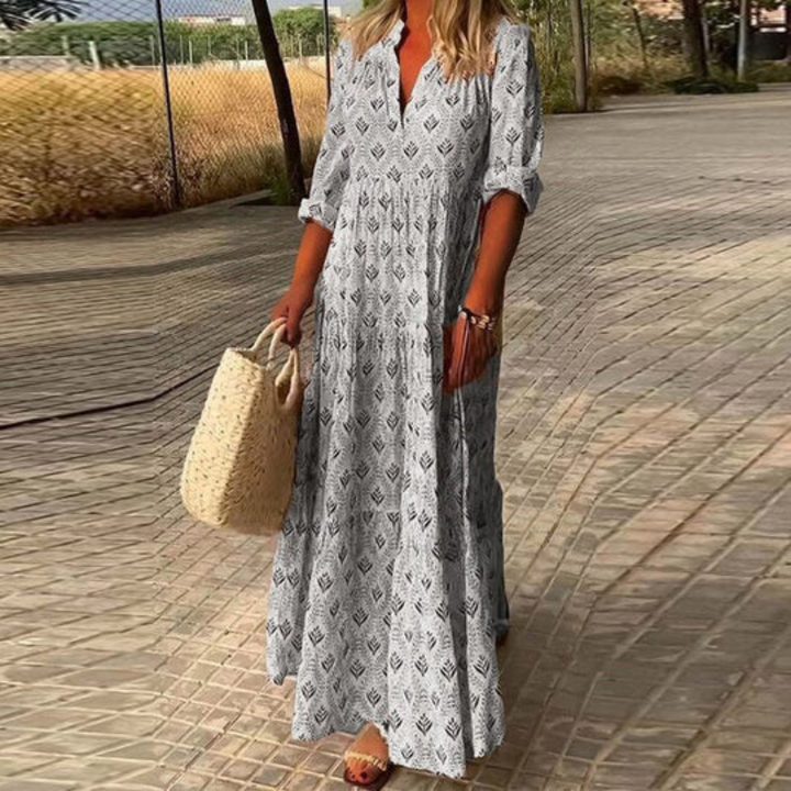 Elegant long women's summer maxi dress. Bohemian style, colorful print, great for beach, resort, or flowy everyday.