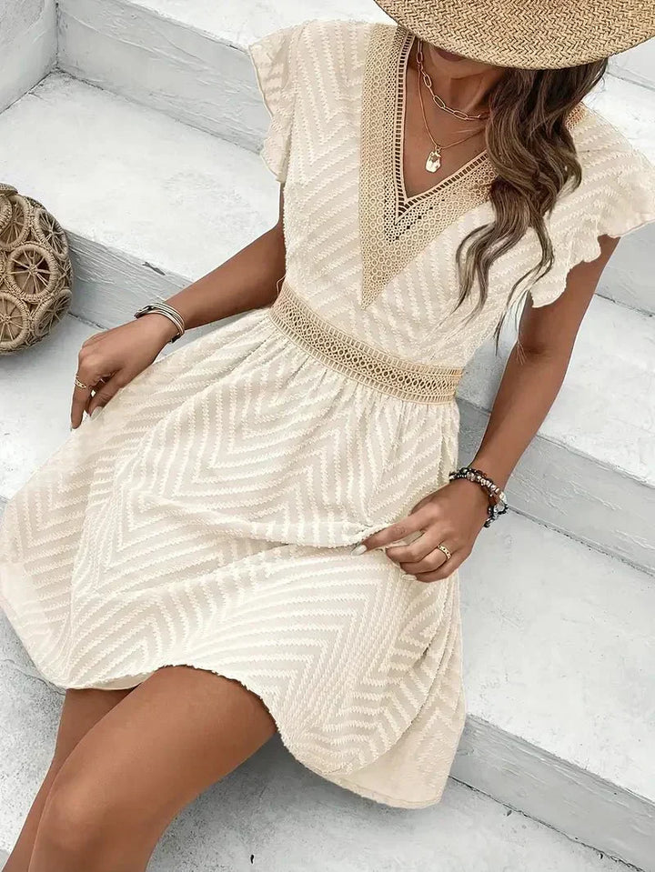 Casual blue flutter sleeve V-neck mini dress, a versatile choice for women's summer style.