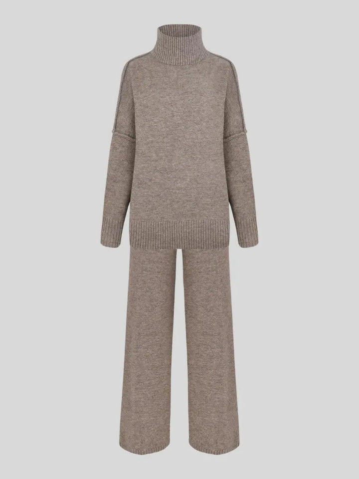 Modern minimalist women's two-piece lounge set, featuring a relaxed turtleneck and wide-leg pants.
