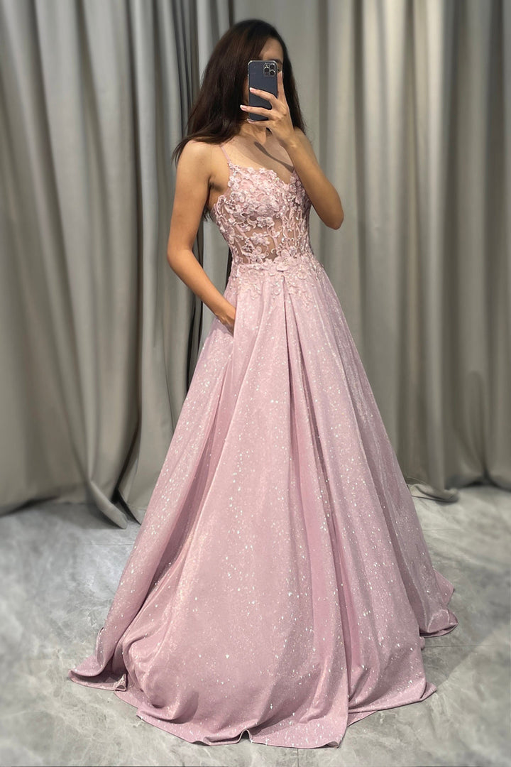 Sophisticated light pink embellished maxi dress for women, a beautiful evening gown or formal wedding guest attire.