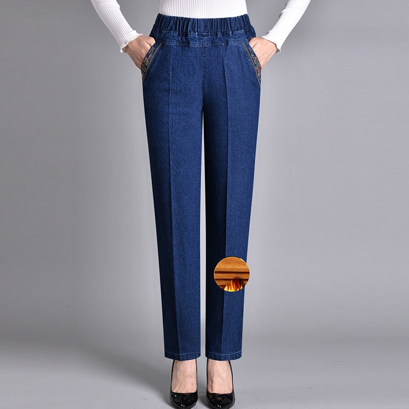 Designed for comfort: women's straight leg stretch jeans with an elastic waist and convenient pockets.