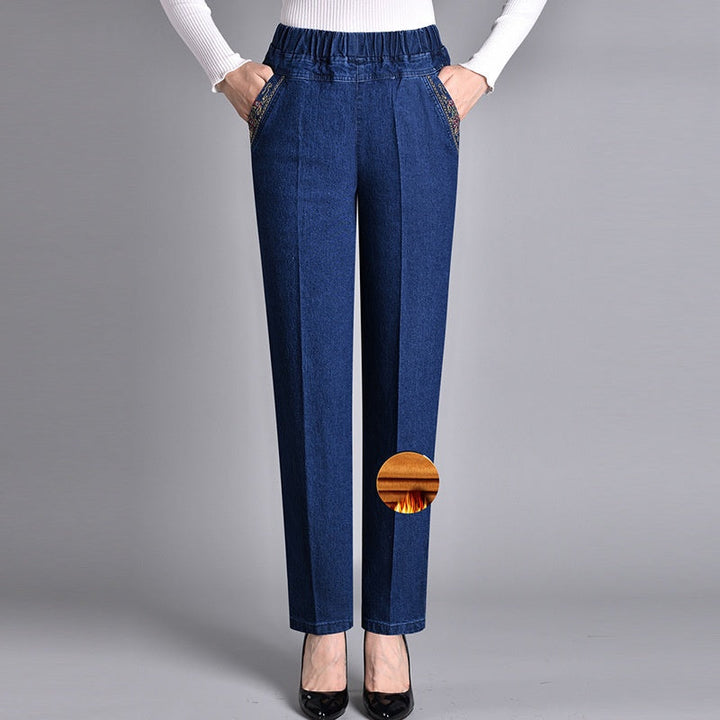 Designed for comfort: women's straight leg stretch jeans with an elastic waist and convenient pockets.