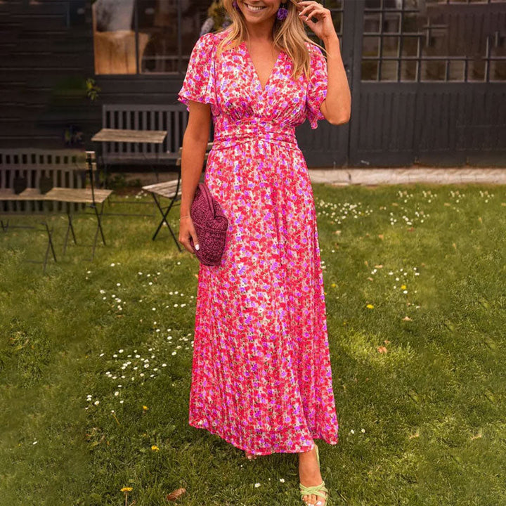 Sophisticated women's V-neck maxi dress, perfect for elegant formal or casual summer wear.