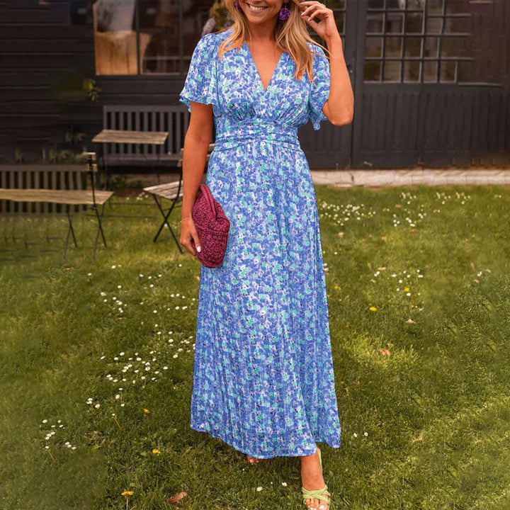 Chic women's V-neck maxi dress, ideal for elegant party wear or sophisticated summer occasions.