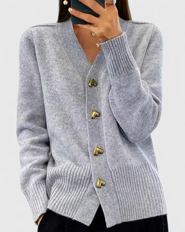 Cozy women's long sleeve cardigan featuring unique heart buttons. Ideal for elegant everyday autumn wear.