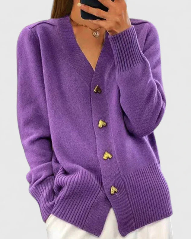 Autumn fashion: Cozy women's long sleeve cardigan with elegant heart buttons. Perfect for chic layering.