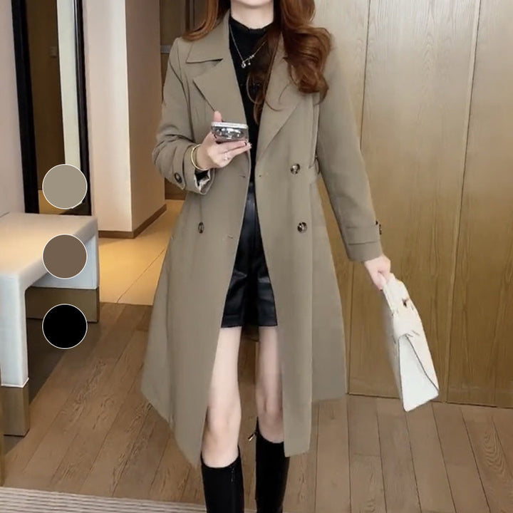 Fashionable women's long trench coat, an elegant and warm jacket for fall and winter.