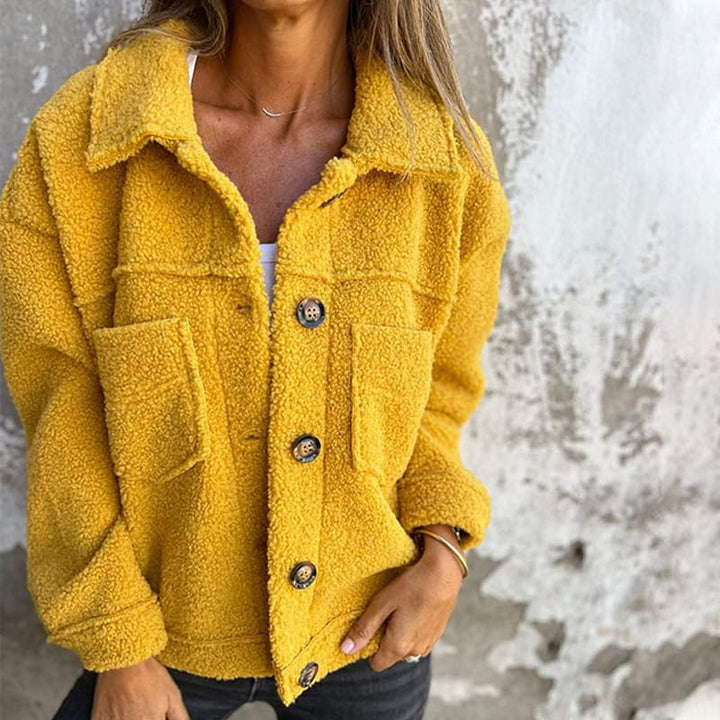 Yellow women's hip-length jacket. Effortlessly stylish & comfortable relaxed fit for casual wear & layering.