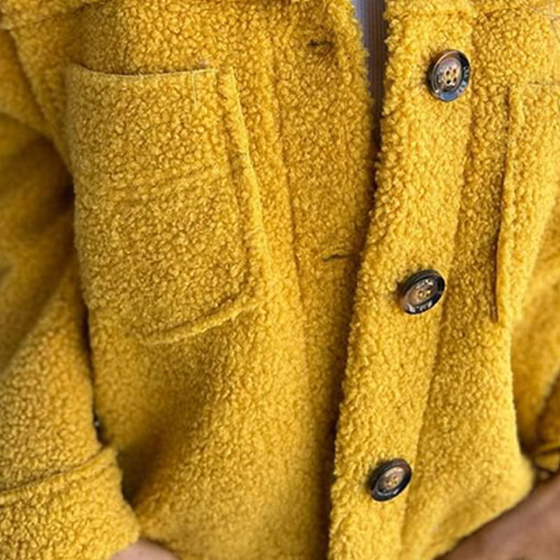 Green women's cosy outerwear. Stylish, relaxed fit jacket for everyday comfort & versatile layering.